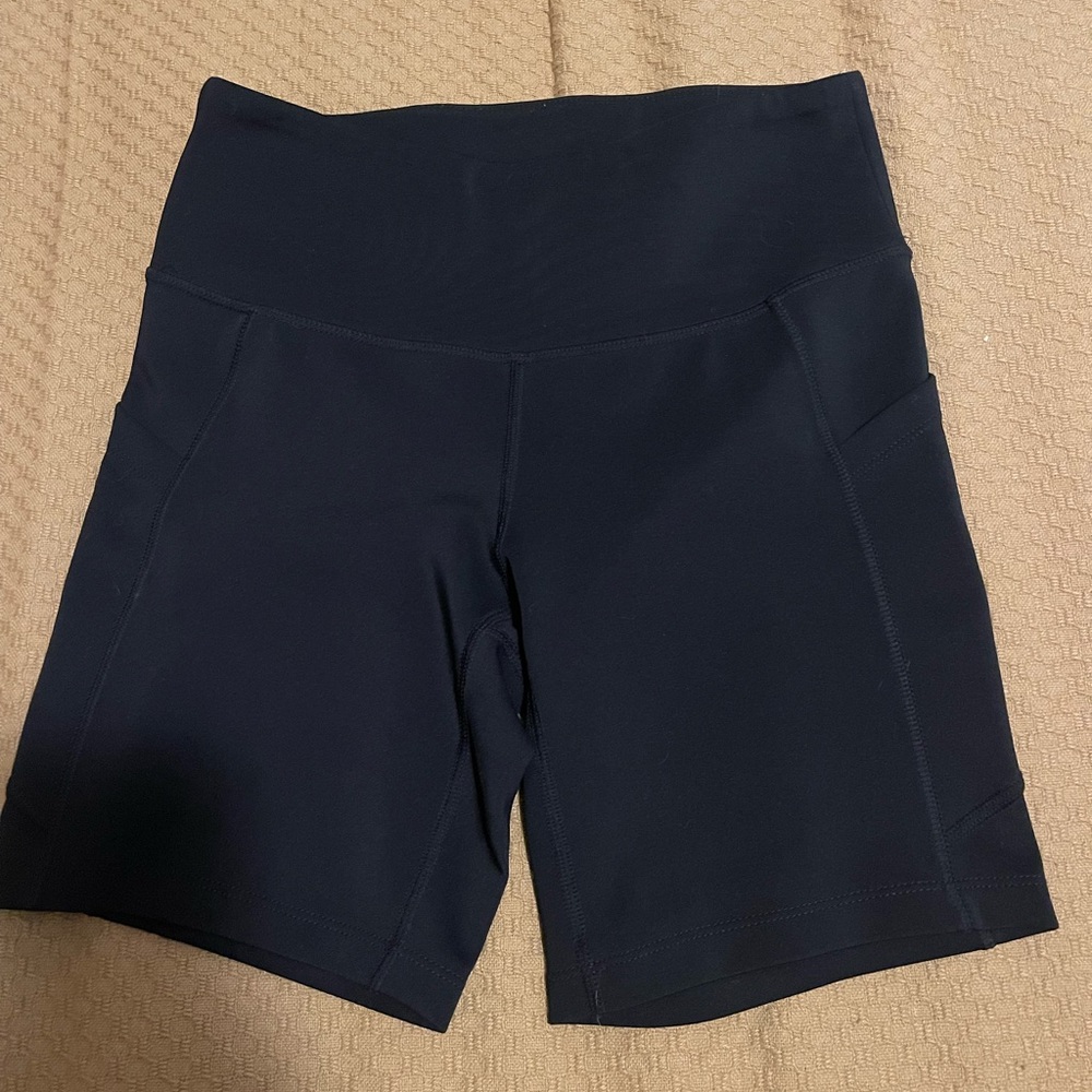 Women's New Balance Black High-Waisted Biker Shorts with Pockets